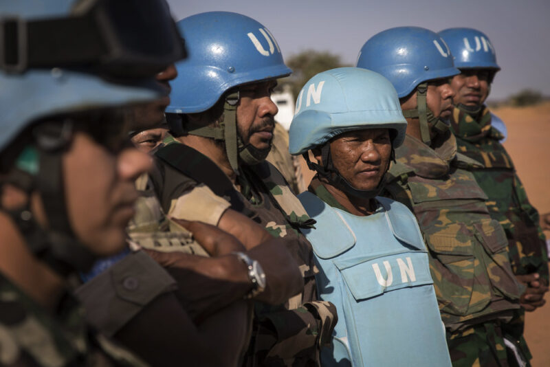 Members of the Nepalese Contingent serving with the United Nations Multidimensional Integrated Stabilization Mission in Mali (MINUSMA) listen to Major General Michael Lollesgaard, Force Commander of MINUSMA, as he addresses the troops during his visit to the airstrip in Kidal, northern Mali.