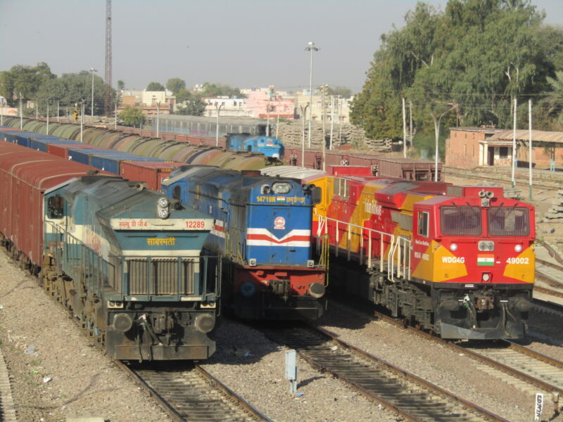 Three different generations of Indian railway locomotives halted at Merta road Junction.