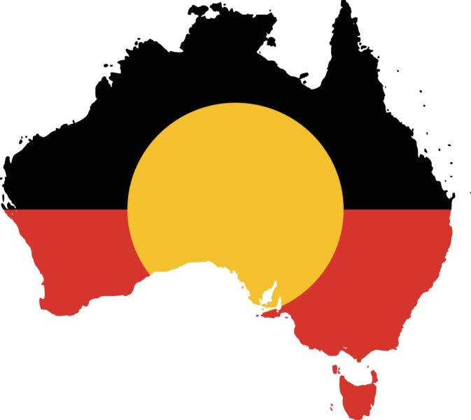 Australia, with the Aboriginal flag imposed. The flag is divided horizontally into black and red, with a golden circle in the center.