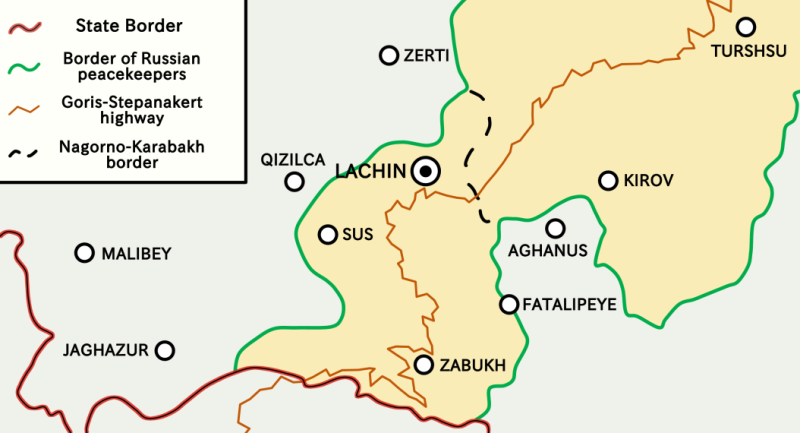 A digital map of the Lachin Corridor, showing the Armenian border (marked in solid red), the Nagorno-Karabakh border (marked in dashed black), the Russian peacekeepers' borders (in solid green), and the Goris-Stepanakert highway (marked in orange) along with several cities. Lachin itself is marked with a large dot inside of the circle marking it as a city.