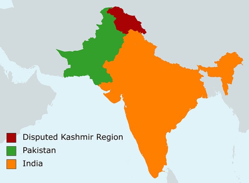 A map, showing India in orange, Pakistan in green, and the Disputed Kashmir Region in red.