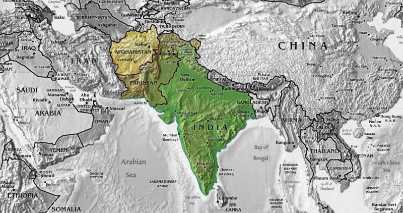 A map of Asia centered on the Indian subcontinent. Afghanistan, Pakistan, and India are marked in yellow, brown, and green, while the other countries are in grayscale.